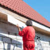 Replacing fascias or cladding